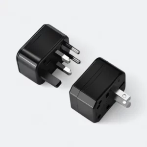 ruko travel adapter in black and white for global use